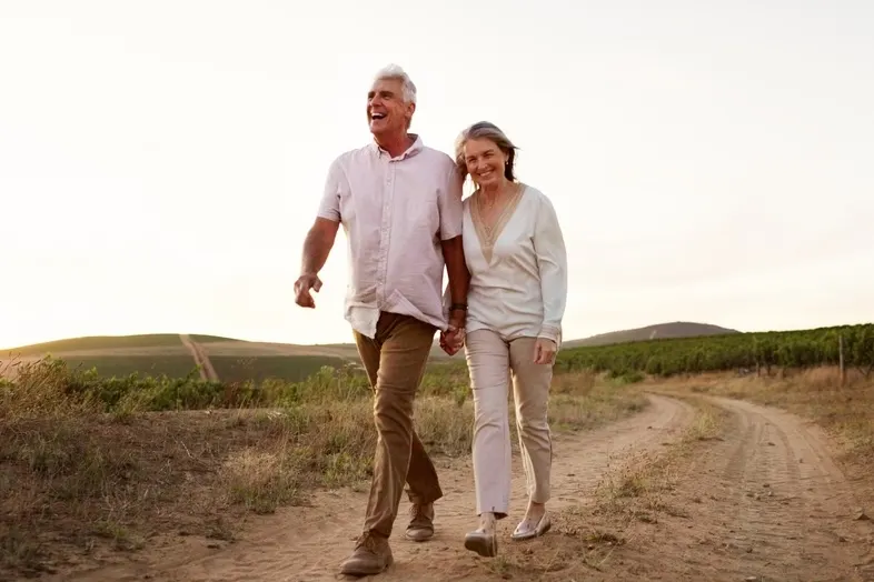 Man and wife walking outside together