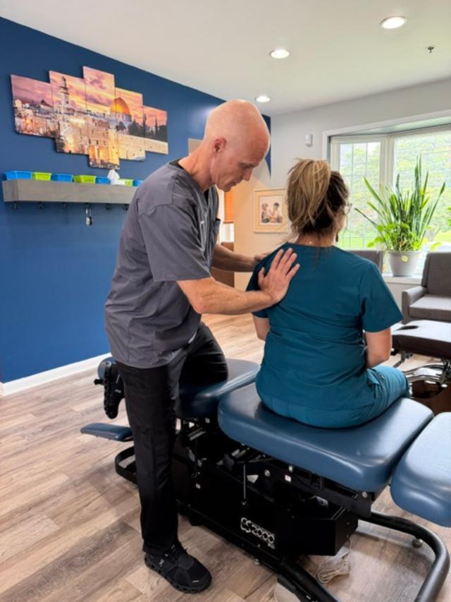 Dr. Dan Klein providing chiropractic care for neck pain in Upper Darby PA